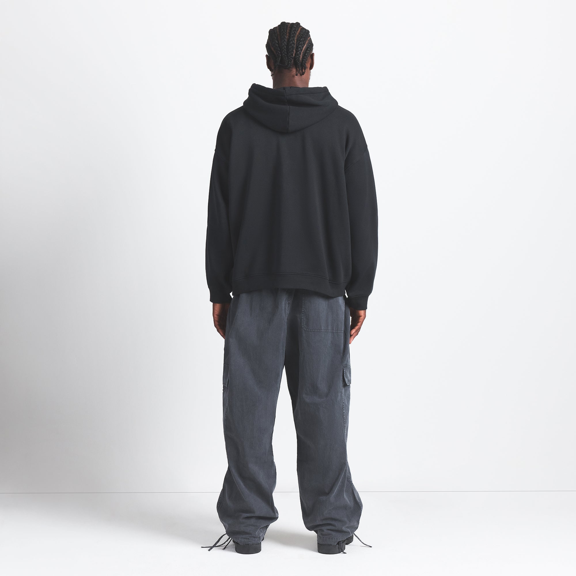 FLEECE LOUNGE MENS RELAXED HOODIE | WASHED ONYX ON A MODEL BACK VIEW @ | FOCUS: 0.0, 1.0, 0.9