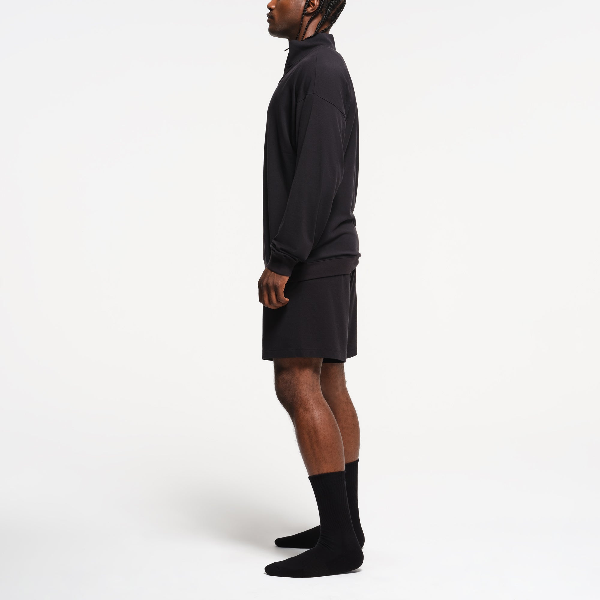 JERSEY LOUNGE MENS RELAXED QUARTER ZIP PULLOVER | OBSIDIAN ON A MODEL SIDE VIEW