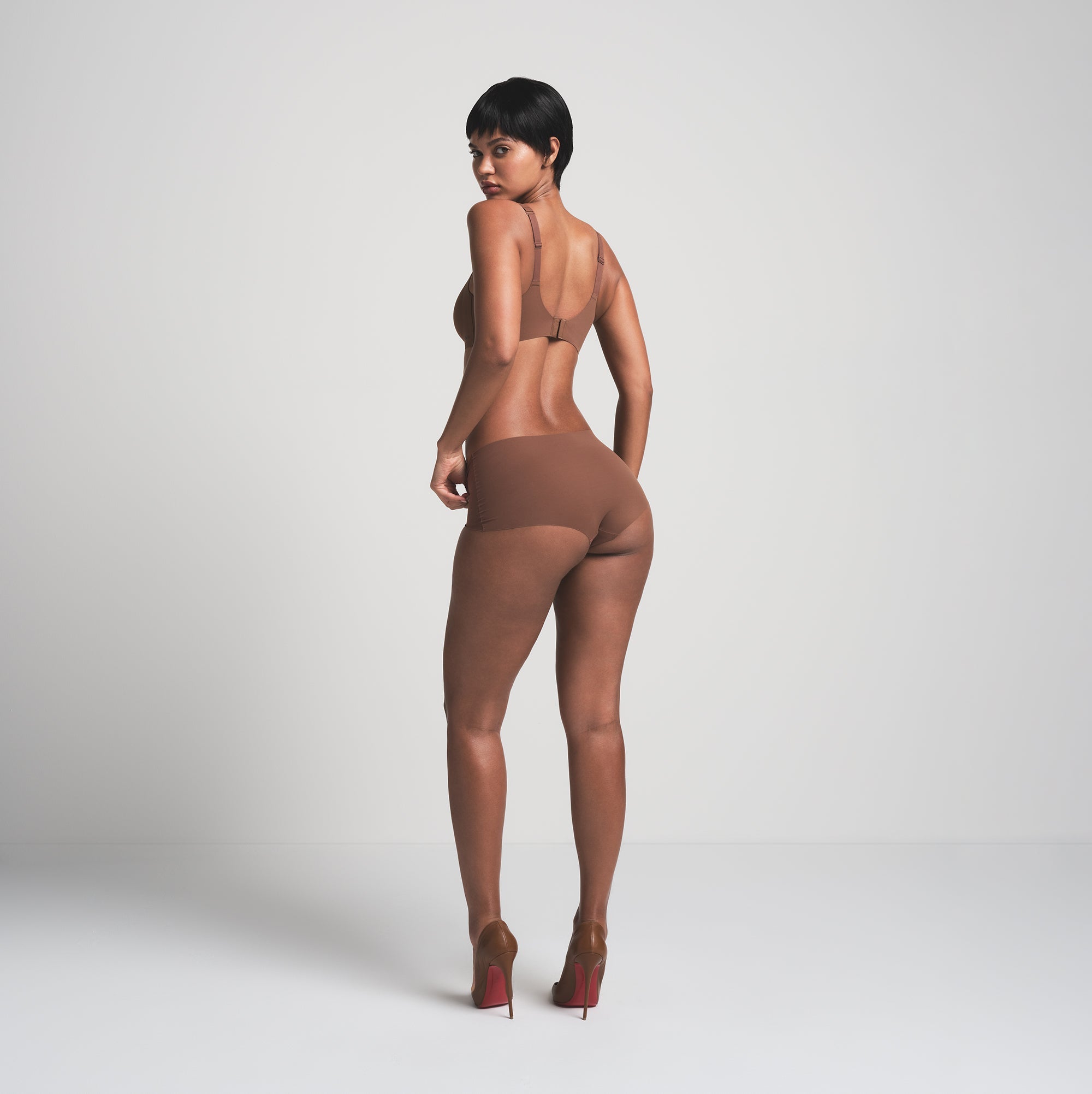 NAKED BOY SHORT WORN BY A MODEL IN BACK VIEW