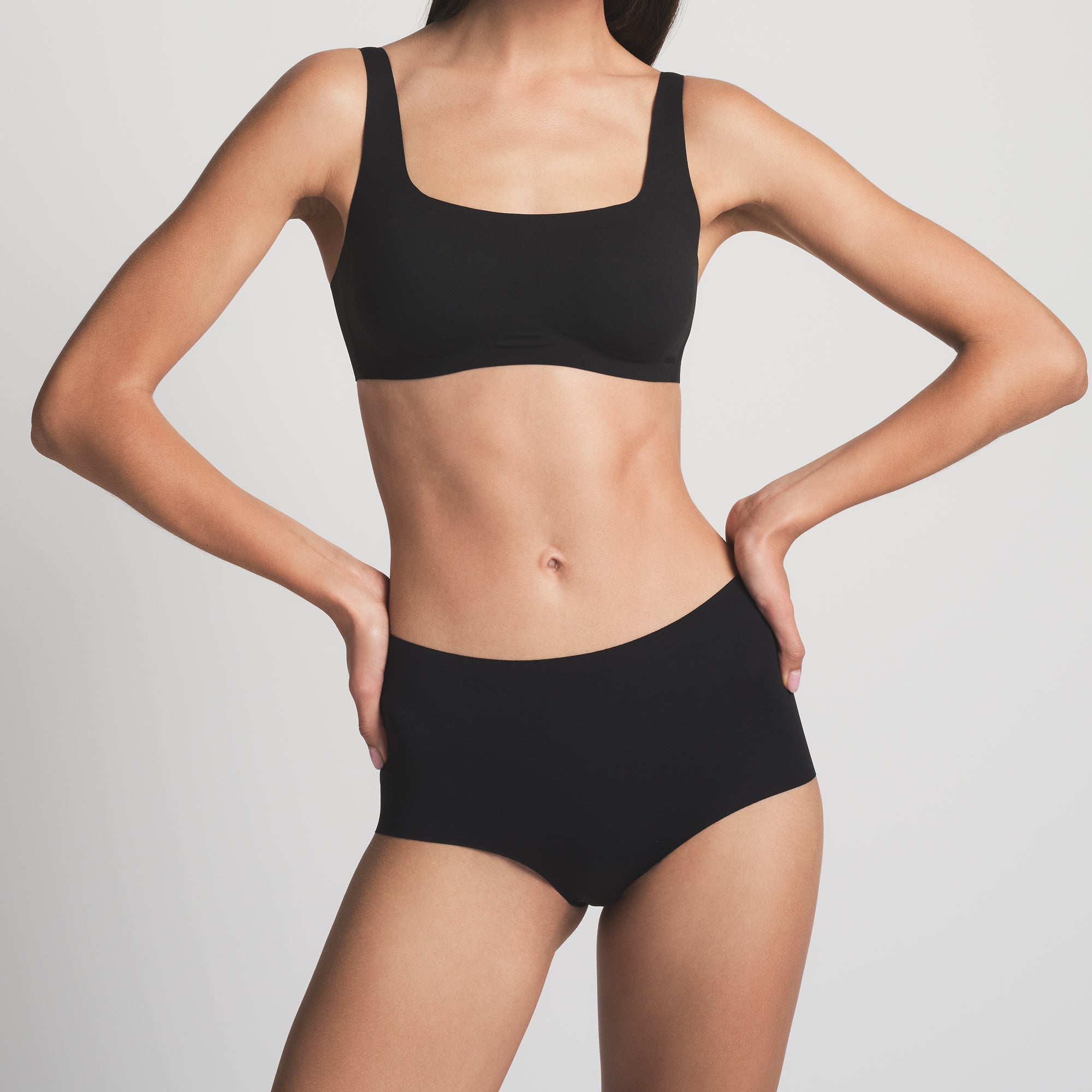 NAKED BOY SHORT | ONYX  ON A MODEL FRONT VIEW 