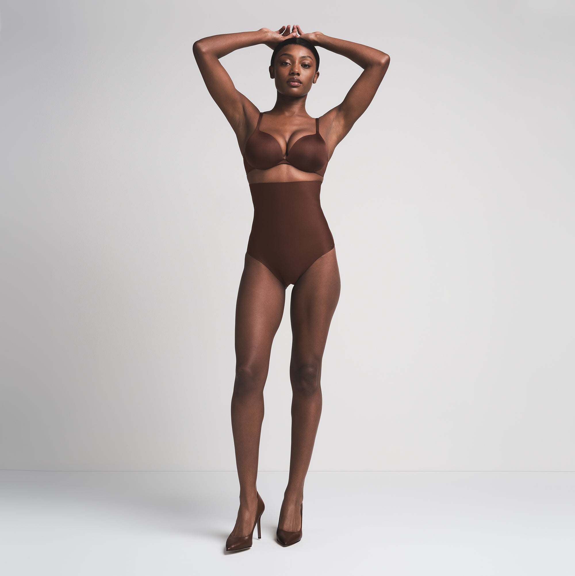 SKIMS BODY CORE SCULPT HIGH-WAISTED BRIEF | COCOA  ON A MODEL FRONT VIEW