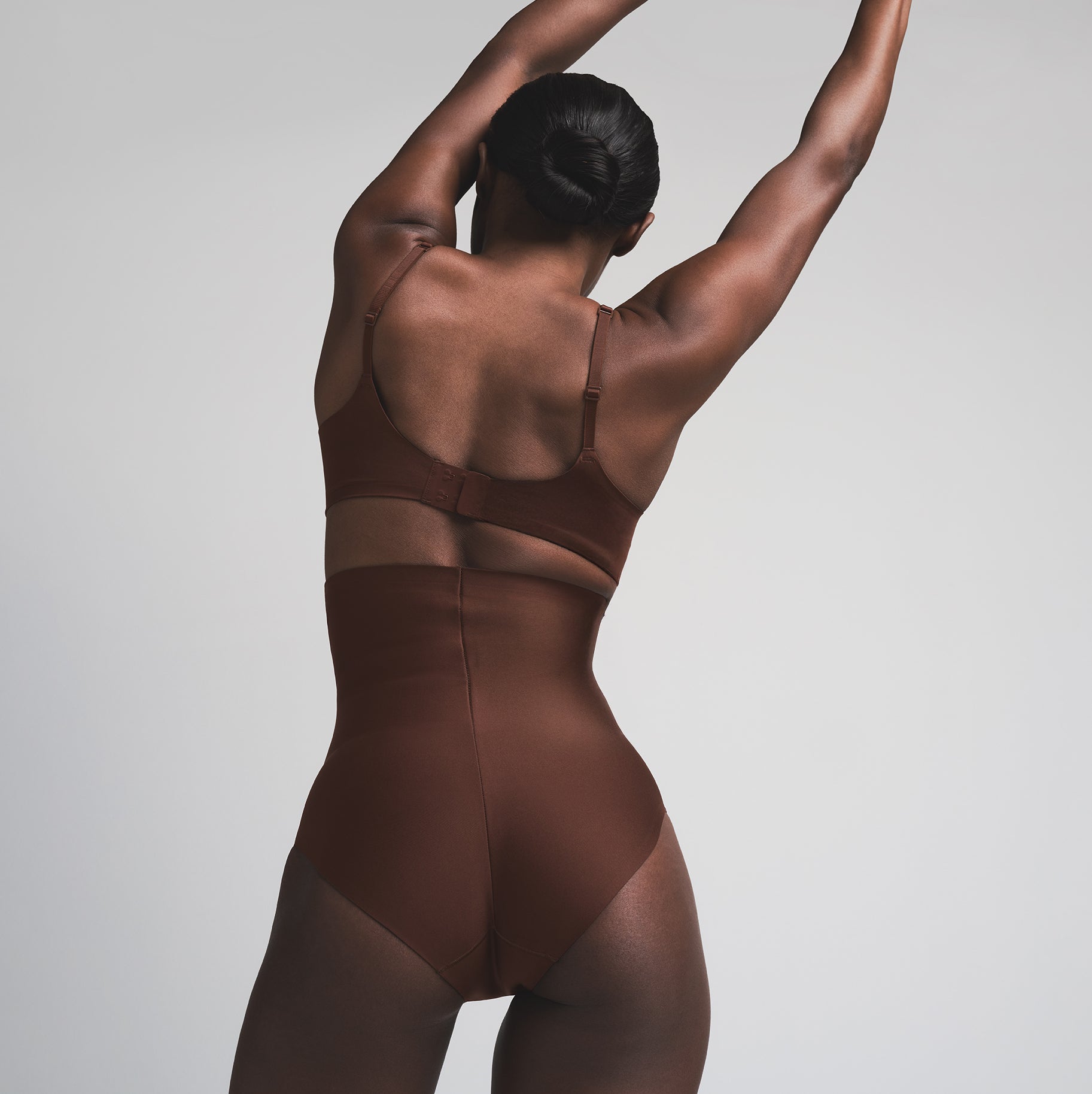 SKIMS BODY CORE SCULPT HIGH-WAISTED BRIEF | COCOA  ON A MODEL BACK VIEW