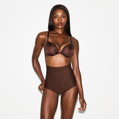SKIMS BODY CORE SCULPT BUTT LIFTING BRIEF | COCOA ON A MODEL SIDE VIEW @