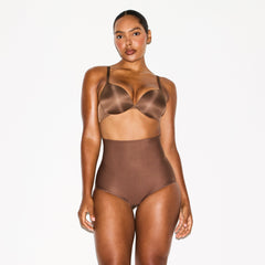 SKIMS BODY CORE SCULPT BUTT LIFTING BRIEF | JASPER ON A MODEL SIDE VIEW @