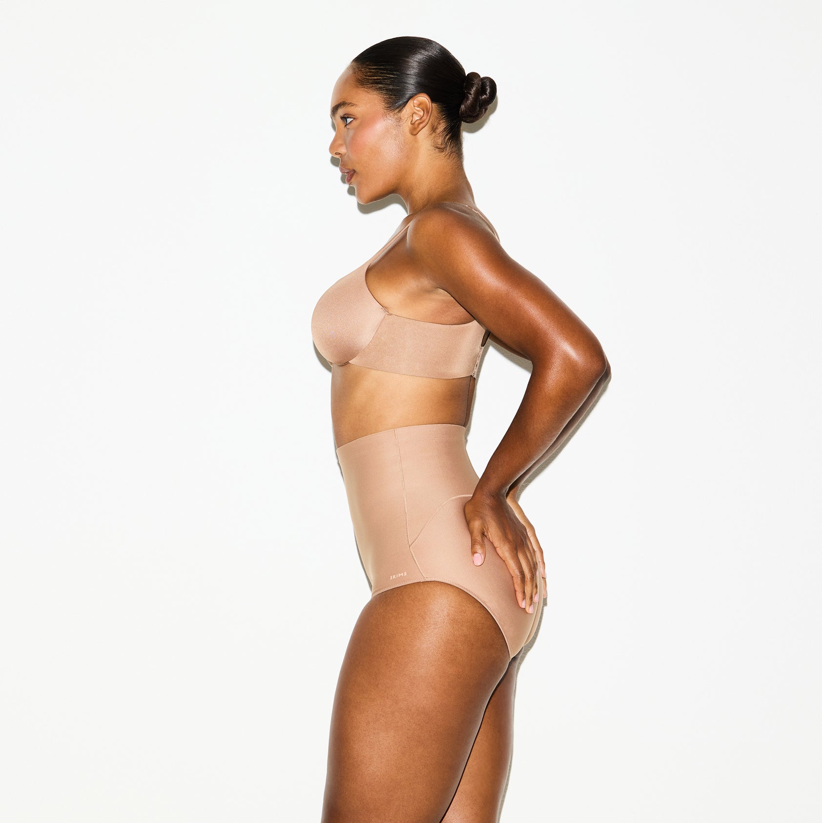 SKIMS BODY CORE SCULPT BUTT LIFTING BRIEF | SIENNA ON A MODEL SIDE VIEW @
