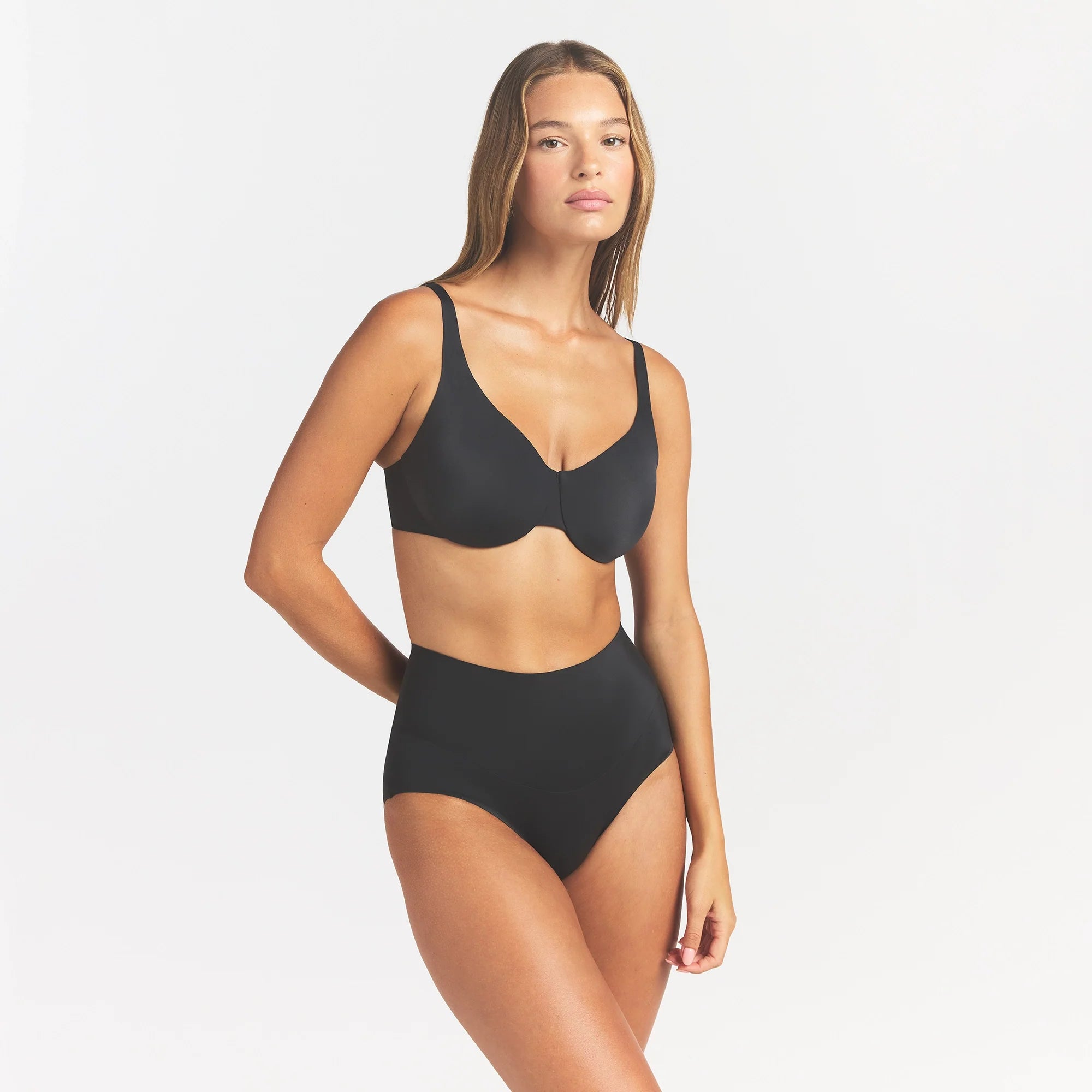SMOOTHING INTIMATES HIGH-WAISTED BRIEF | ONYX ON A MODEL FRONT VIEW @ | FOCUS: 0.0, 1.0, 0.9