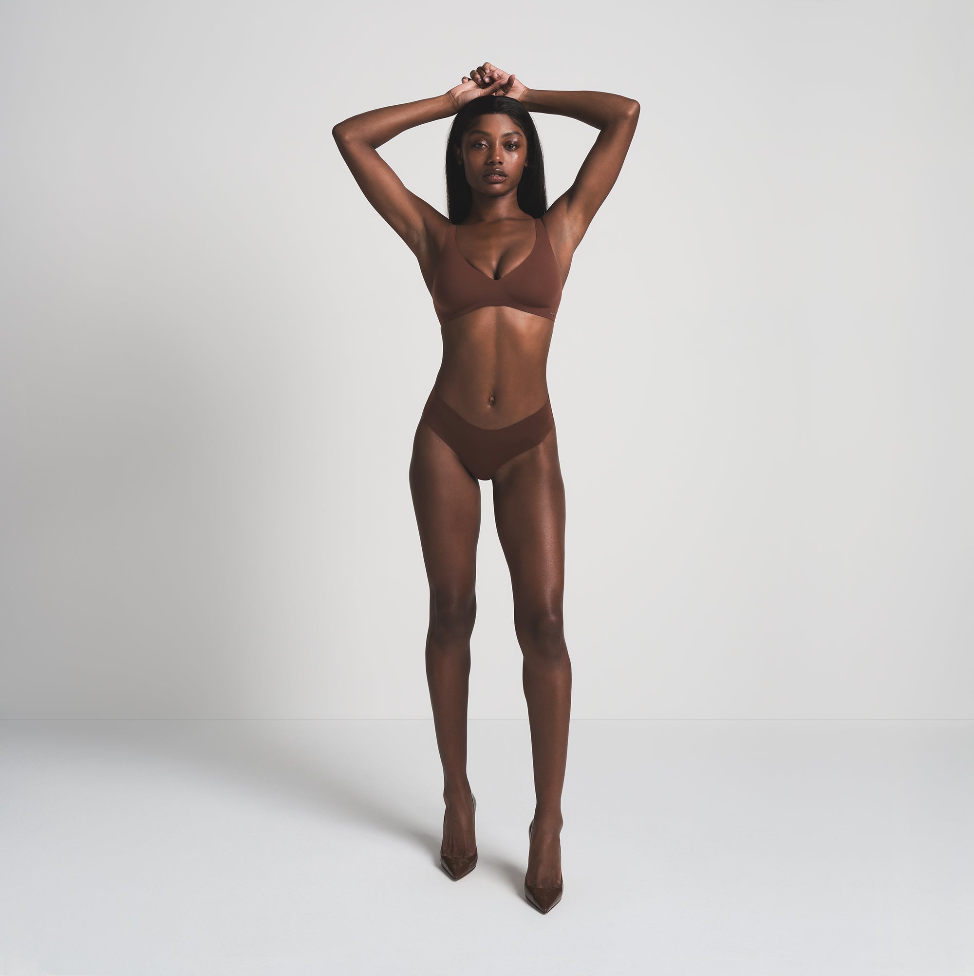 NAKED CHEEKY HIPSTER | COCOA ON A MODEL BACK VIEW COCOA  | FOCUS: 0.0, 1.0, 0.9