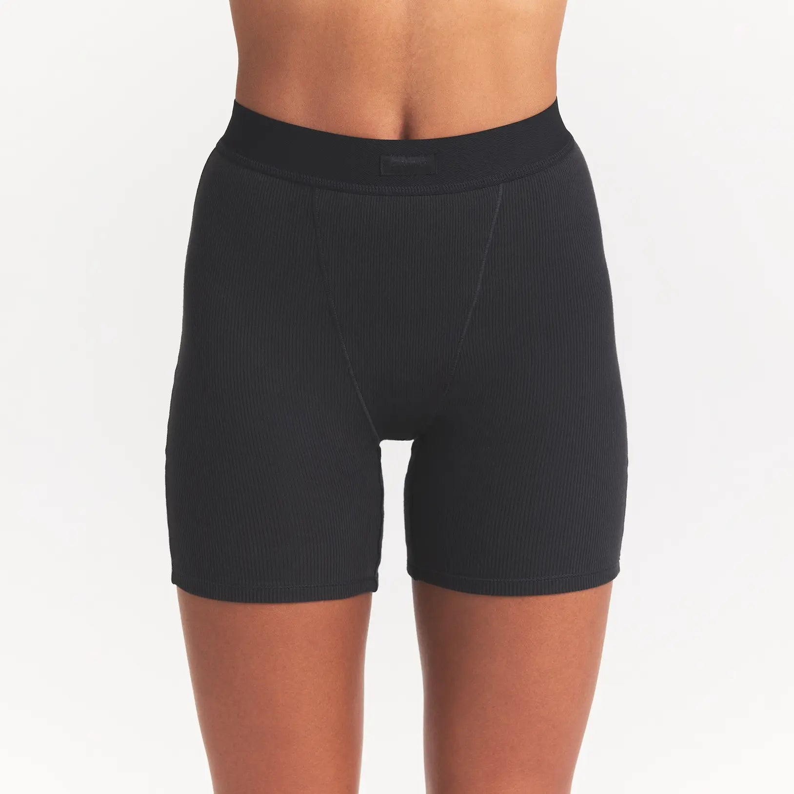 COTTON RIB BOXER | SOOT ON A MODEL FRONT VIEW @ | FOCUS: 0.0, 1.0, 0.9