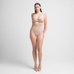 SEAMLESS SCULPT MID WAIST THONG | MICA ON A MODEL FRONT VIEW | FOCUS: 0.0, 1.0, 0.9
