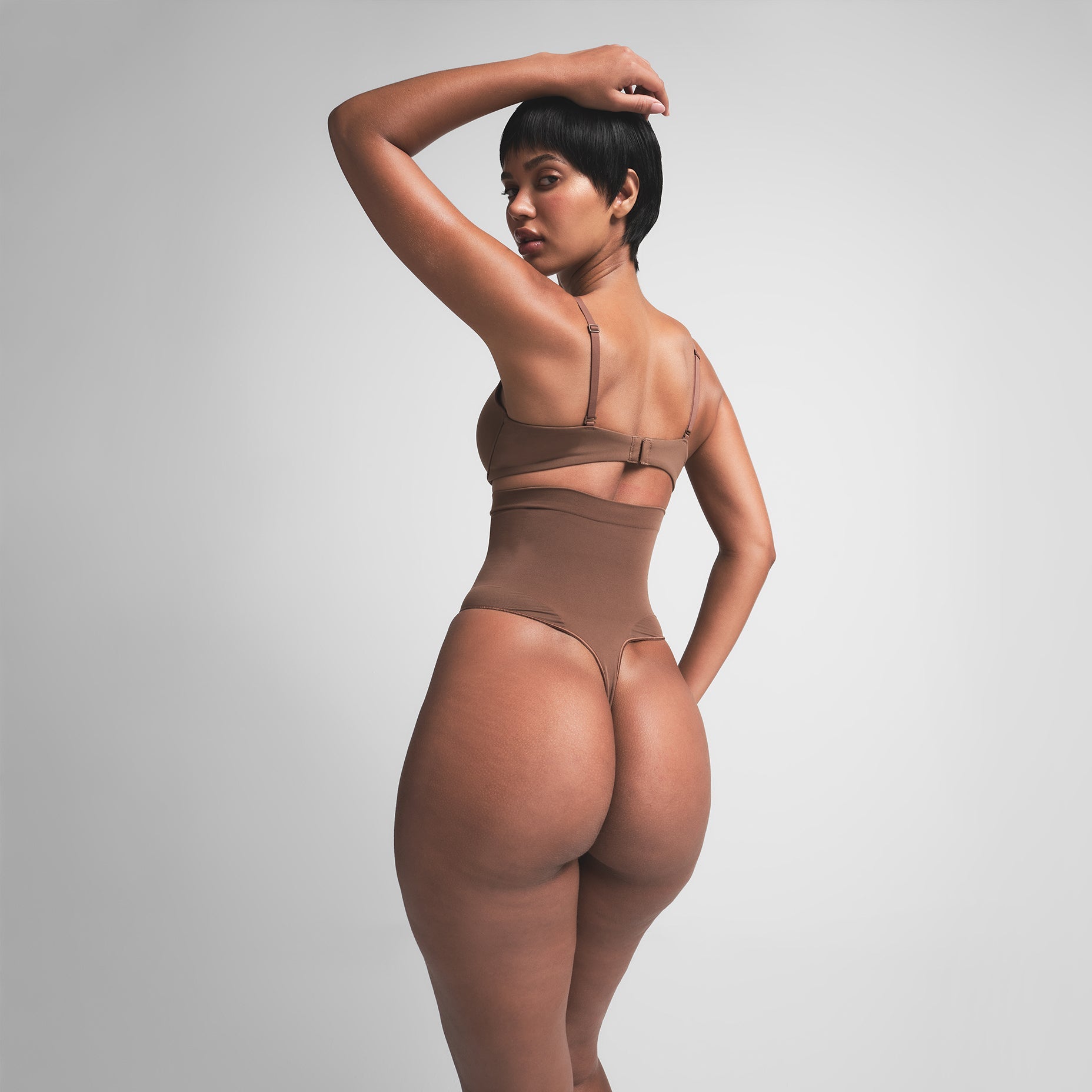 SEAMLESS SCULPT HIGH-WAISTED THONG | JASPER ON A MODEL BACK VIEW