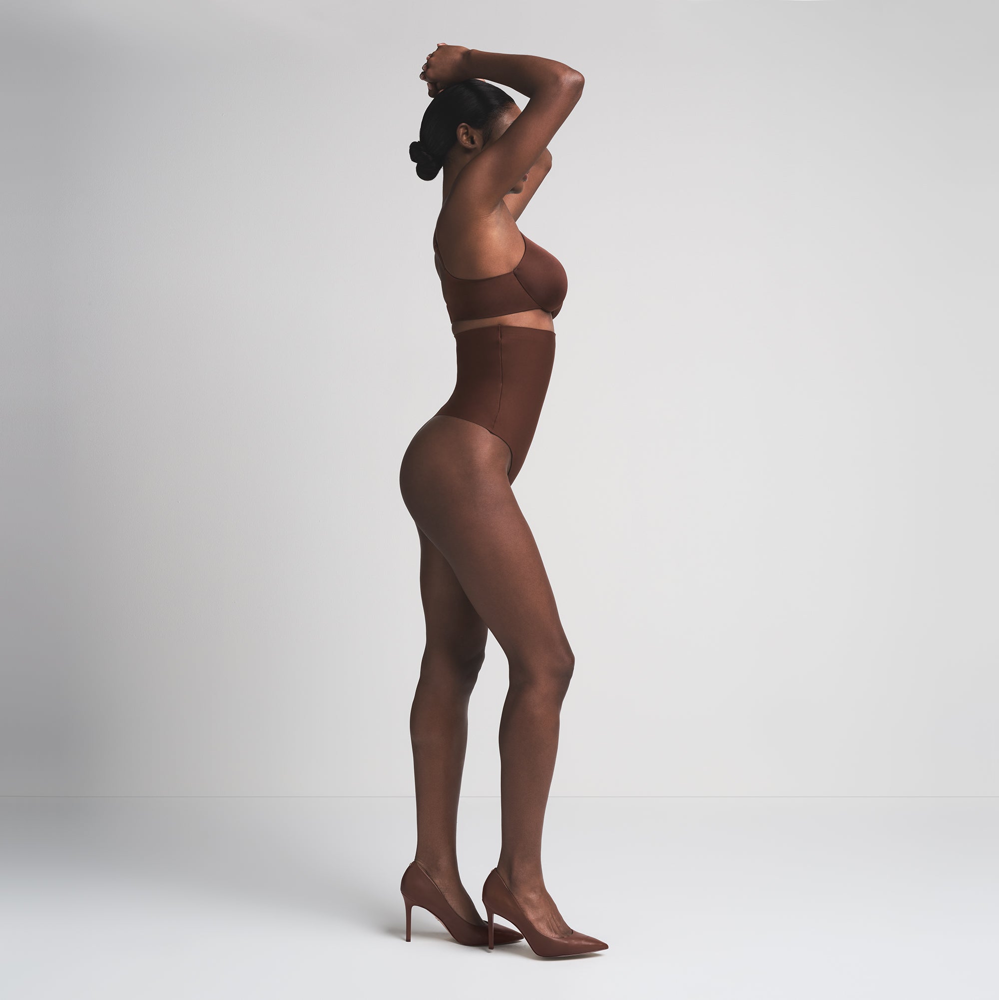 SKIMS BODY CORE SCULPT HIGH-WAISTED THONG | COCOA  ON A MODEL SIDE VIEW