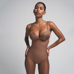 SKIMS BODY CORE SCULPT HIGH-WAISTED THONG | JASPER  ON A MODEL FRONT VIEW