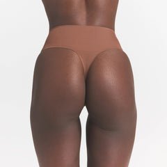 SMOOTHING INTIMATES HIGH-WAISTED THONG | JASPER ON A MODEL BACK VIEW @ | FOCUS: 0.0, 1.0, 0.9