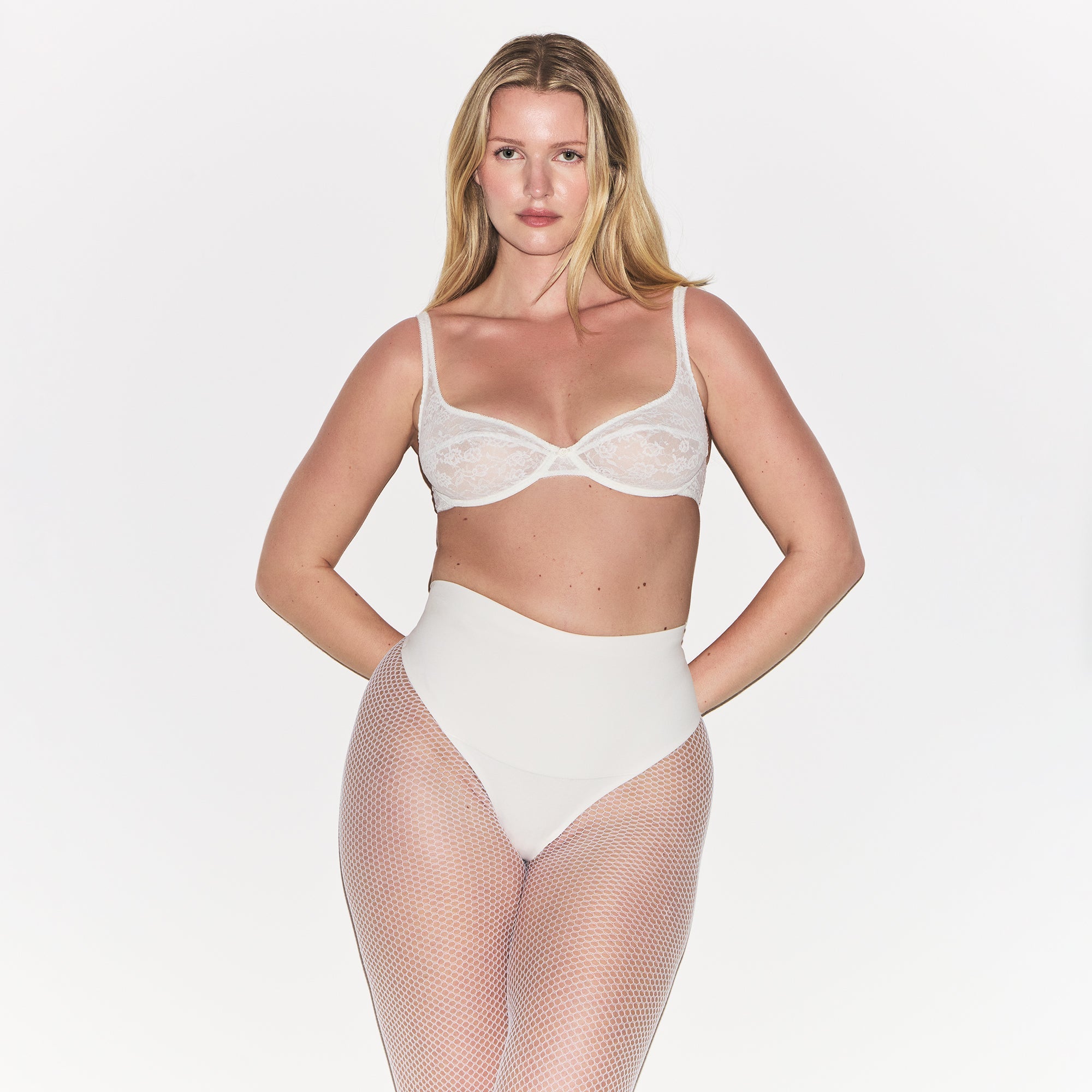 COTTON SHAPEWEAR HIGH-WAISTED THONG | MARBLE ON A MODEL FRONT VIEW | FOCUS: 0.0, 1.0, 0.9