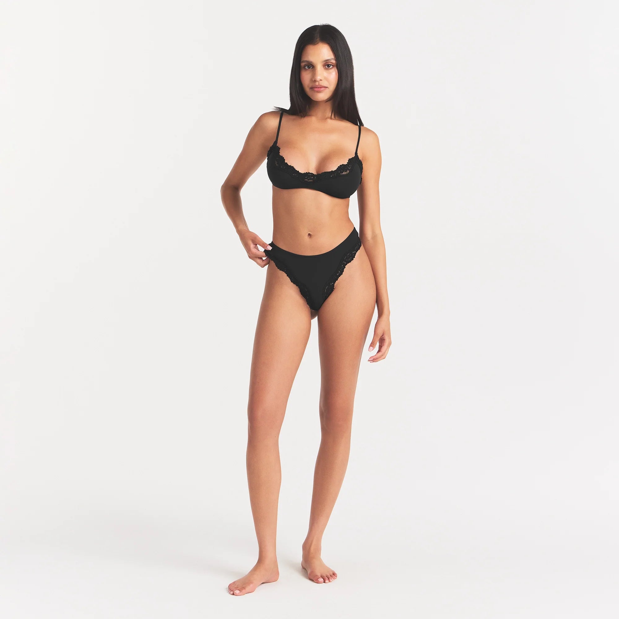 FITS EVERYBODY LACE TANGA | ONYX ON A MODEL BACK VIEW