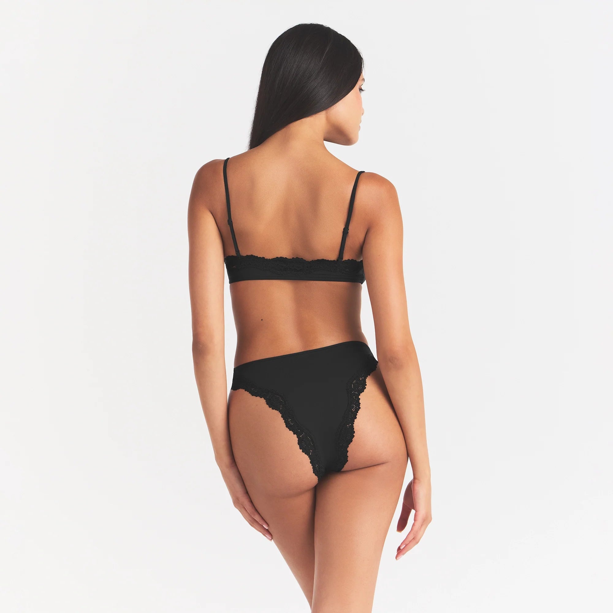 FITS EVERYBODY LACE TANGA | ONYX ON A MODEL BACK VIEW