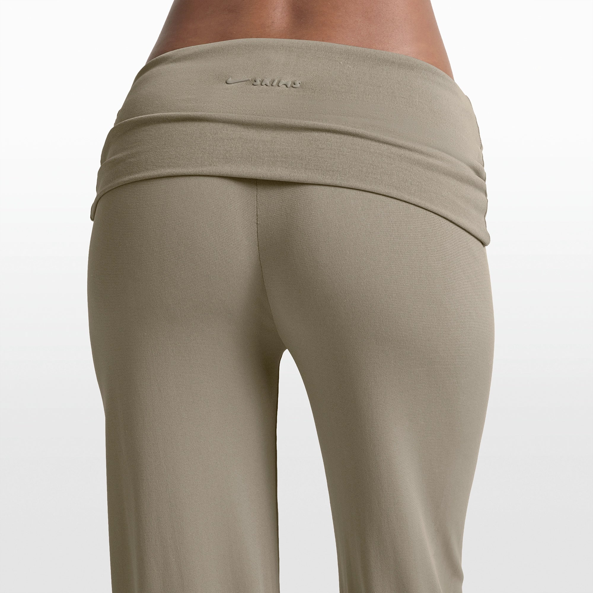 NikeSKIMS STRETCH KNIT FOLDOVER WIDE LEG PANT | DUNE ON A MODEL FRONT VIEW @ | FOCUS: 0.0, 1.0, 0.9