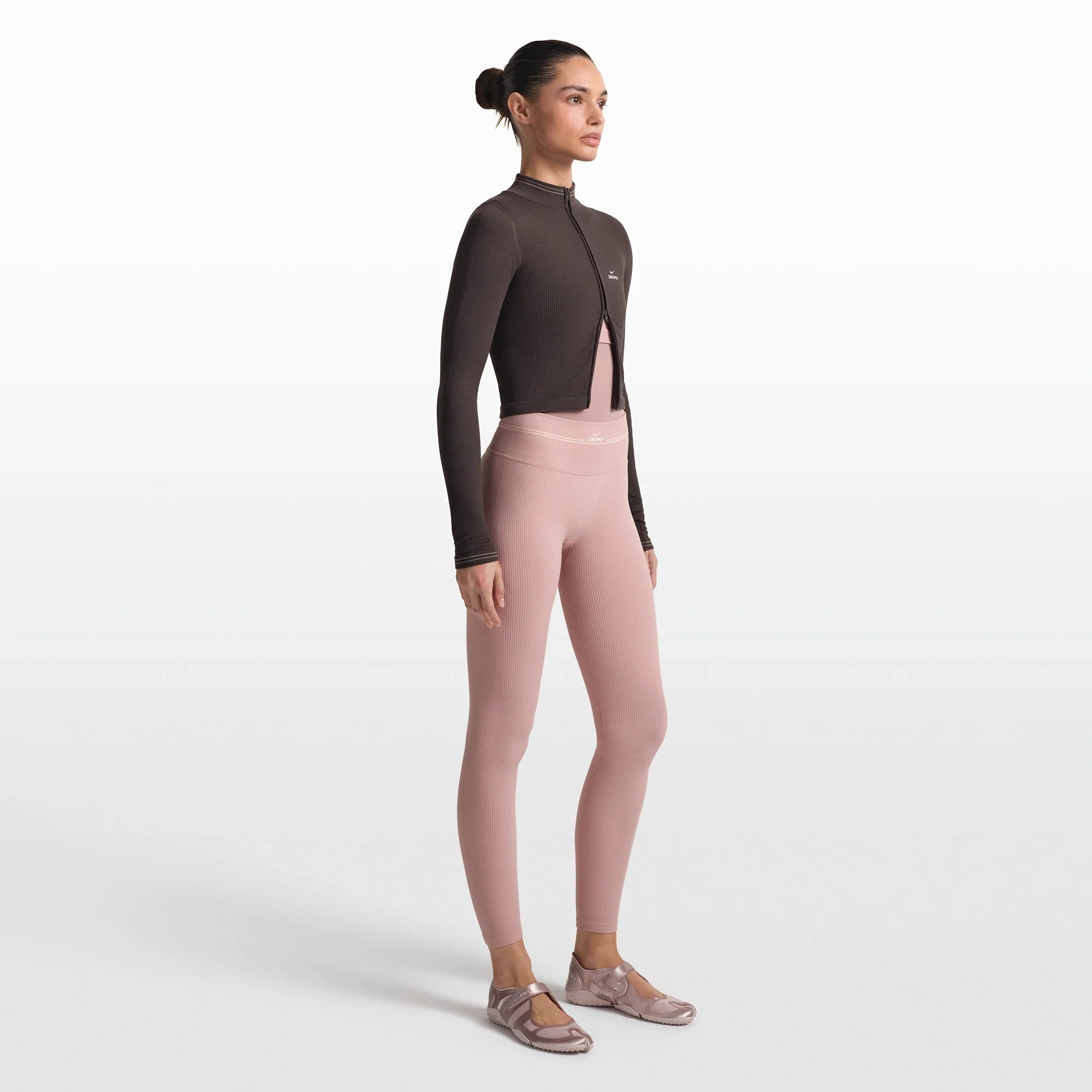 NikeSKIMS RIBBED SEAMLESS 26" LEGGING | HIMALAYAN/ECRU ON A MODEL FRONT VIEW @ | FOCUS: 0.0, 1.0, 0.9