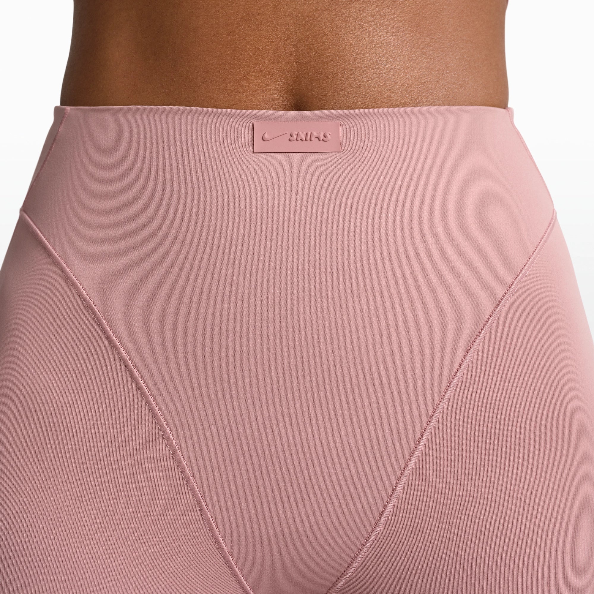 NikeSKIMS MATTE 17" V-LINE CROP LEGGING | HIMALAYAN ON A MODEL FRONT VIEW @ | FOCUS: 0.0, 1.0, 0.9