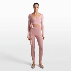 NikeSKIMS MATTE V-LINE STIRRUP LEGGING | HIMALAYAN ON A MODEL FRONT VIEW @ | FOCUS: 0.0, 1.0, 0.9