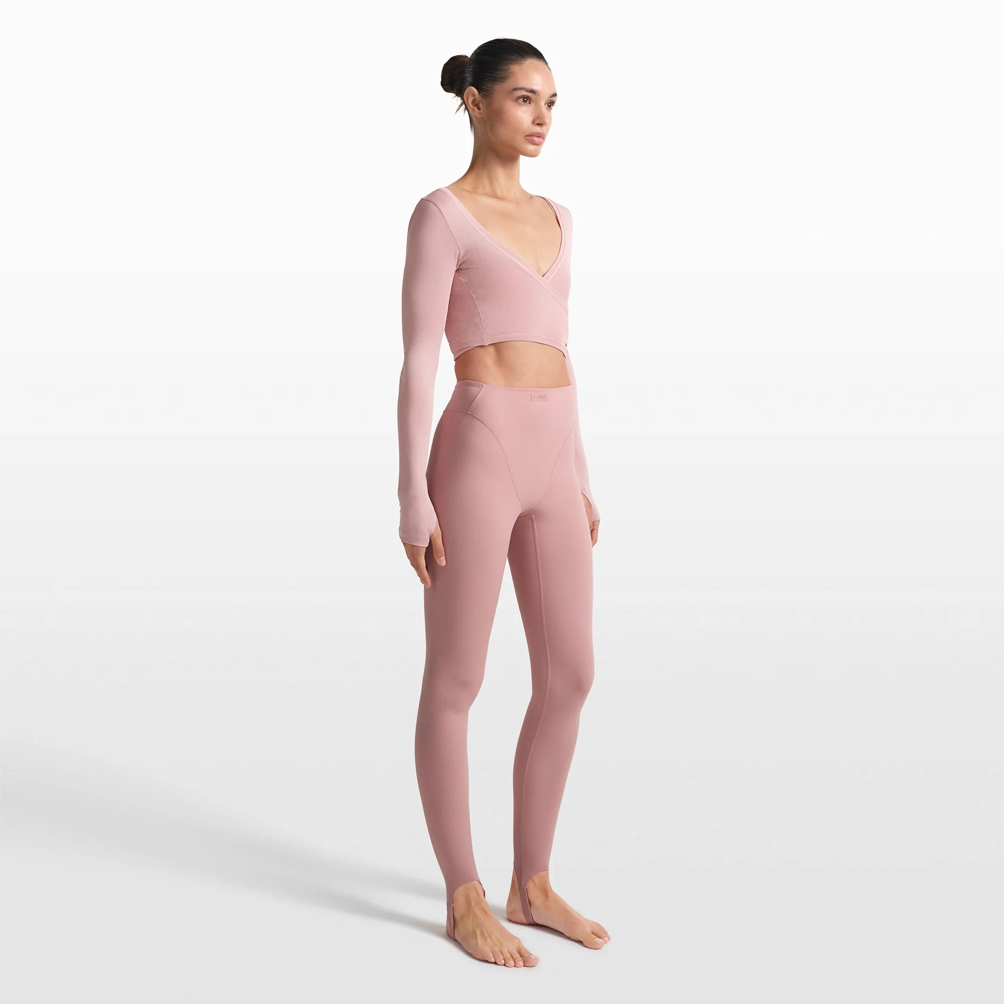 NikeSKIMS MATTE V-LINE STIRRUP LEGGING | HIMALAYAN ON A MODEL FRONT VIEW @ | FOCUS: 0.0, 1.0, 0.9