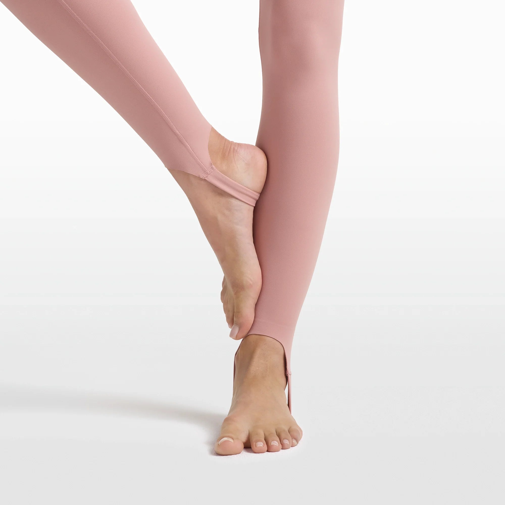 NikeSKIMS MATTE V-LINE STIRRUP LEGGING | HIMALAYAN ON A MODEL FRONT VIEW @ | FOCUS: 0.0, 1.0, 0.9