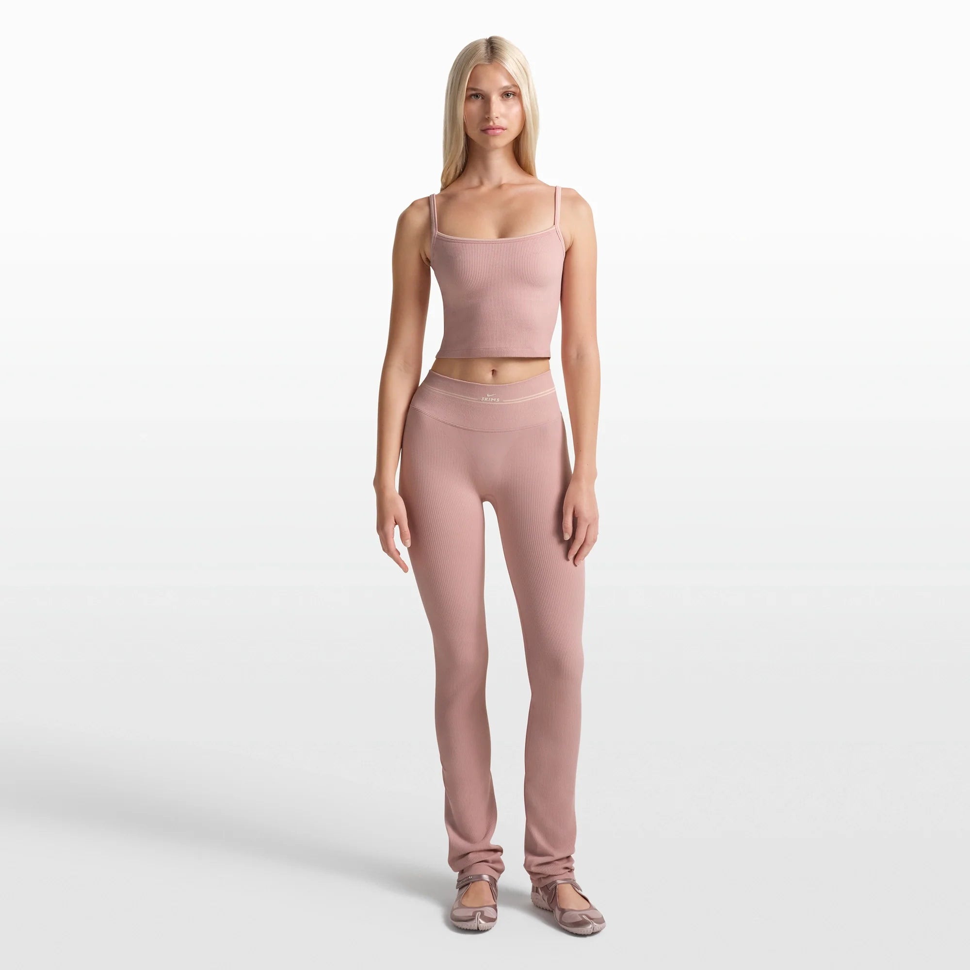NikeSKIMS RIBBED SEAMLESS 34" STRAIGHT LEGGING | HIMALAYAN/ECRU ON A MODEL FRONT VIEW @ | FOCUS: 0.0, 1.0, 0.9