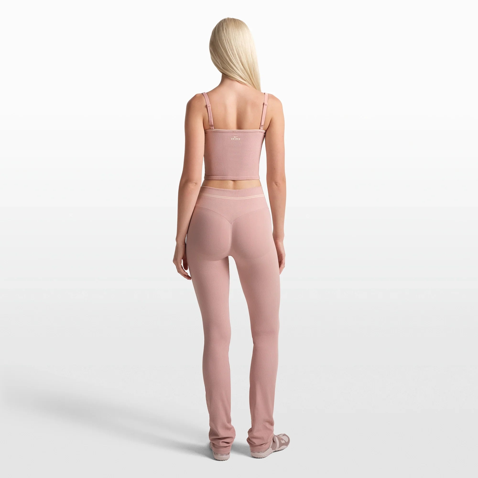 NikeSKIMS RIBBED SEAMLESS 34" STRAIGHT LEGGING | HIMALAYAN/ECRU ON A MODEL FRONT VIEW @ | FOCUS: 0.0, 1.0, 0.9