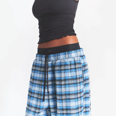 OUTDOOR FLANNEL OVERSIZED DOUBLE WAISTBAND PANT | AZURE PLAID & LAYS FLAT ON A WHITE BACKGROUND | FLT