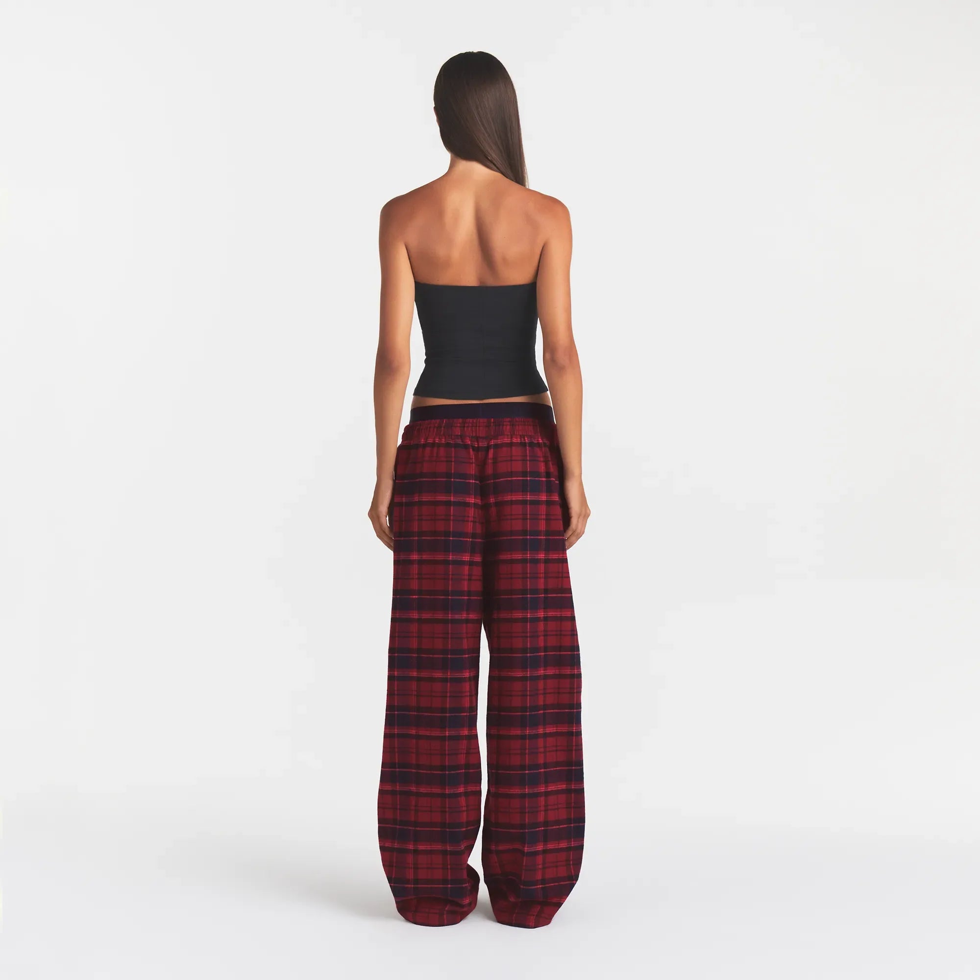 OUTDOOR FLANNEL OVERSIZED DOUBLE WAISTBAND PANT | MERLOT CABIN PLAID ON A MODEL | FOCUS: 0.0, 1.0, 0.9