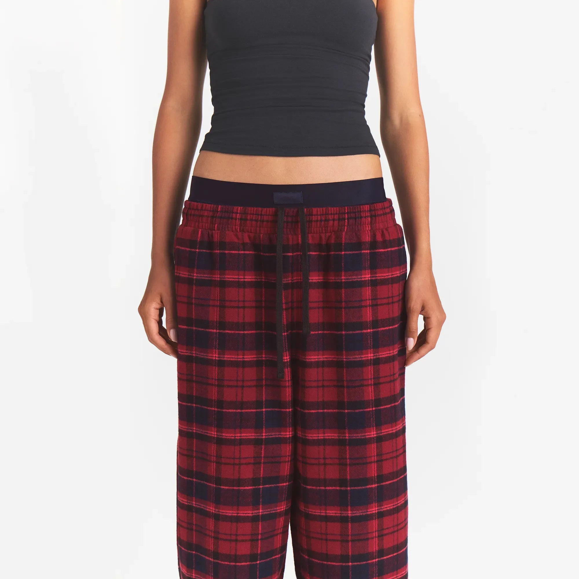 OUTDOOR FLANNEL OVERSIZED DOUBLE WAISTBAND PANT | MERLOT CABIN PLAID ON A MODEL | FOCUS: 0.0, 1.0, 0.9