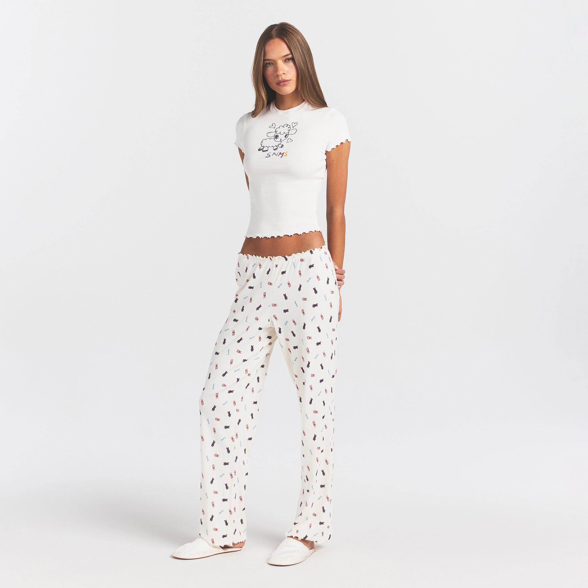 LOGO POINTELLE STRAIGHT LEG PANT | MARBLE TOSSED BUNNY ON A MODEL SIDE VIEW @ | FOCUS: 0.0, 1.0, 0.9
