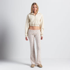 COTTON JERSEY FOLDOVER PANT | OATMEAL HEATHER HOLLY PRINT ON A MODEL FRONT VIEW @ | FOCUS: 0.0, 1.0, 0.9