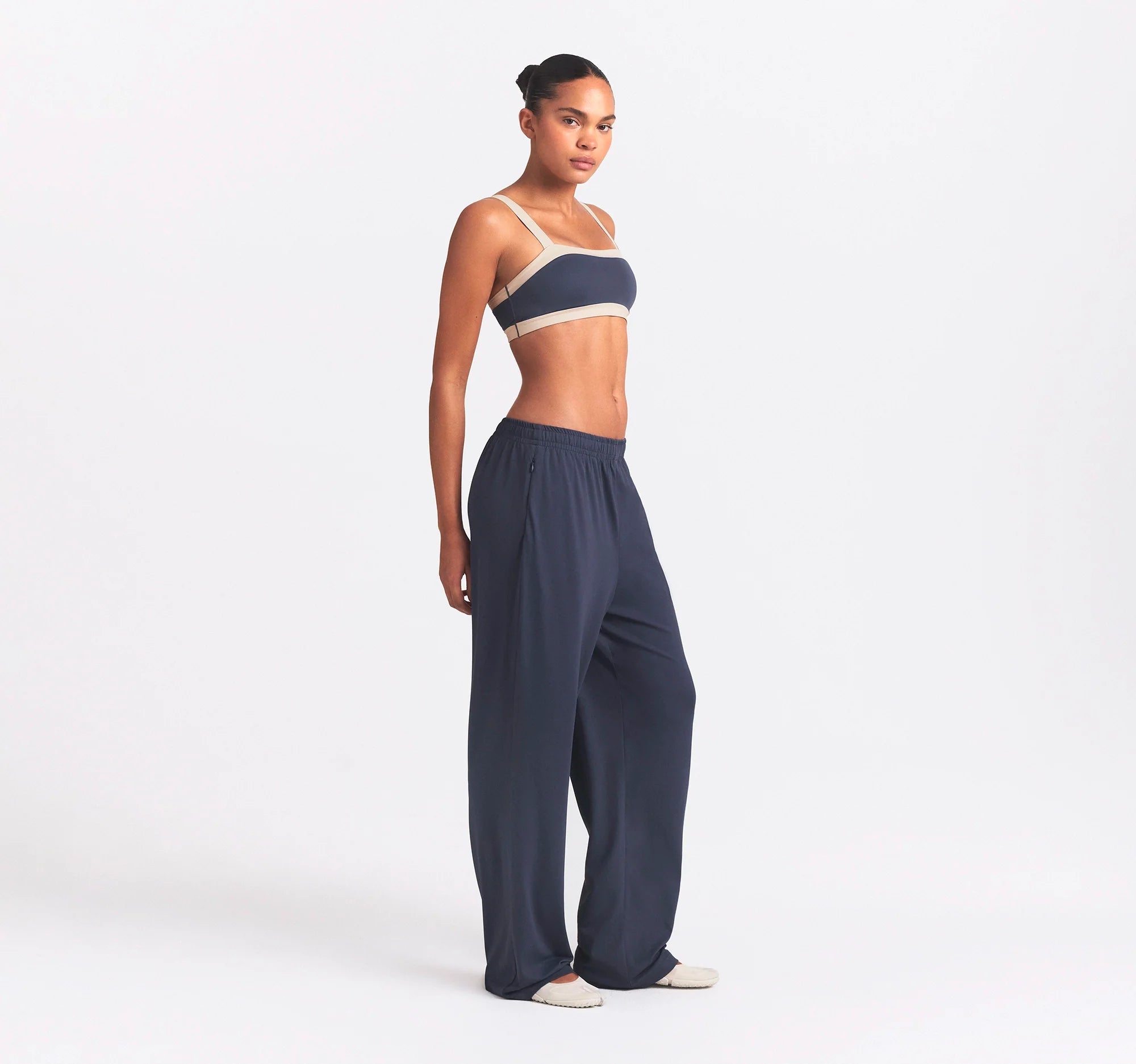 NikeSKIMS AIRY WIDE LEG PANT | DEEP ROYAL ON A MODEL SIDE VIEW @ | FOCUS: 0.0, 1.0, 0.9