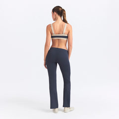 NikeSKIMS AIRY STRAIGHT LEG PANT | DEEP ROYAL ON A MODEL SIDE VIEW @ | FOCUS: 0.0, 1.0, 0.9