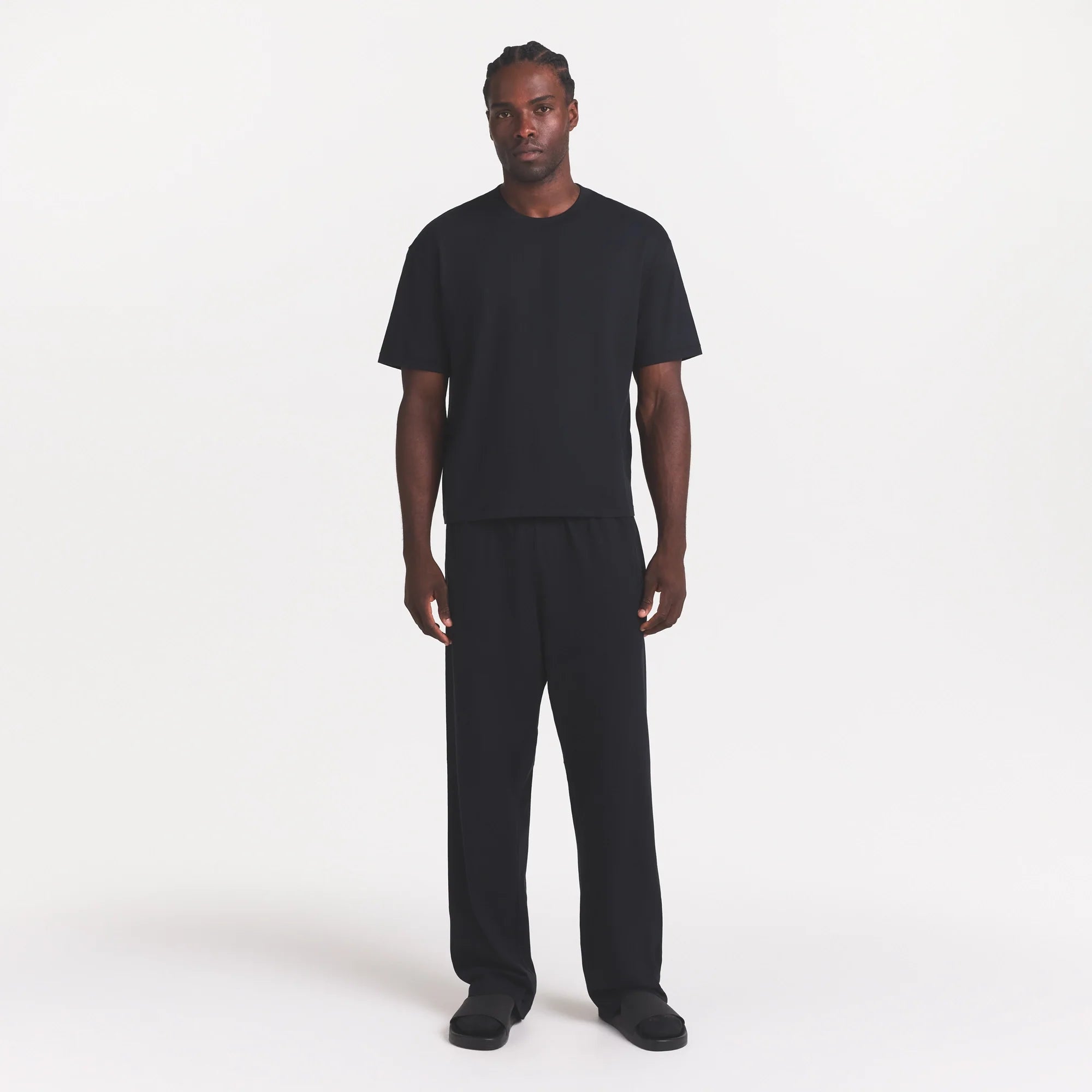 HEAVYWEIGHT COTTON MENS RELAXED PANT | OBSIDIAN ON A MODEL FRONT VIEW
