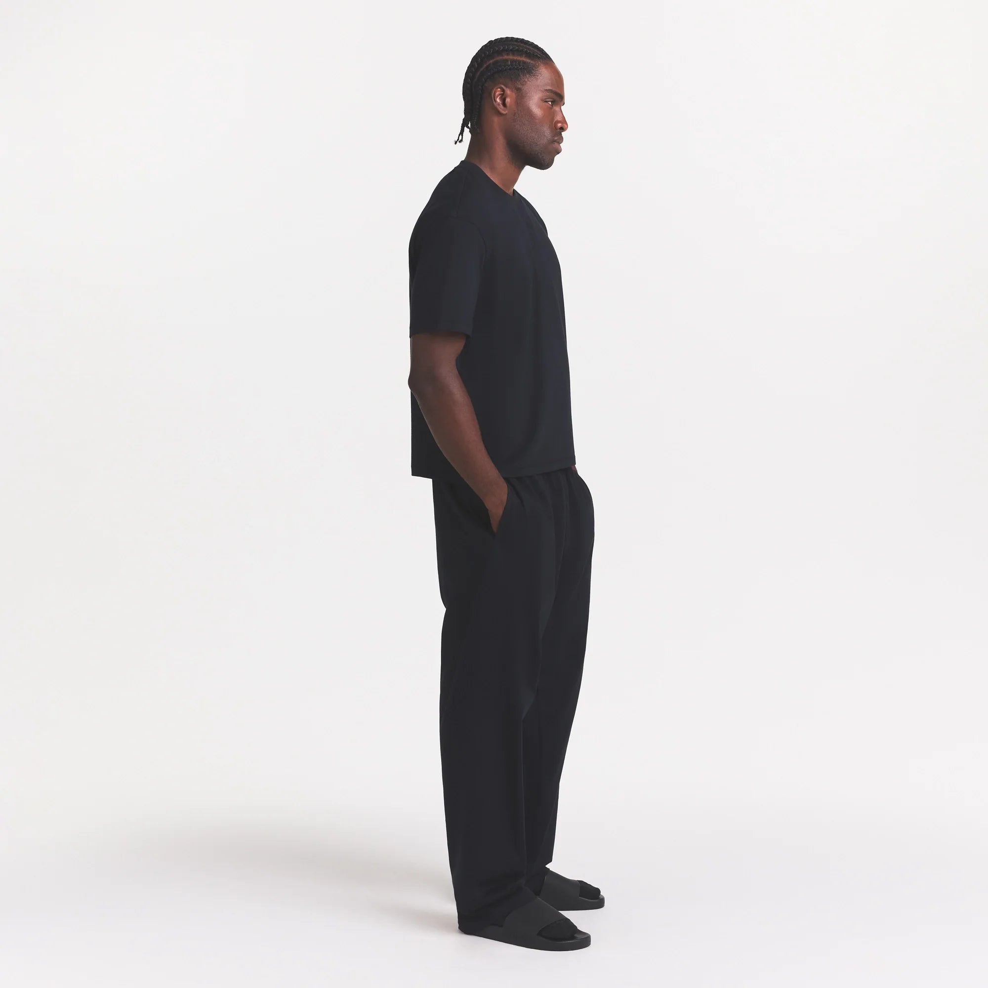 HEAVYWEIGHT COTTON MENS RELAXED PANT | OBSIDIAN ON A MODEL FRONT VIEW