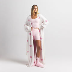 COZY KNIT UNISEX ROBE | IVORY SPACED HEARTS ON A MODEL FRONT VIEW @ | FOCUS: 0.0, 1.0, 0.9