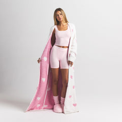 COZY KNIT UNISEX ROBE | IVORY SPACED HEARTS ON A MODEL FRONT VIEW @ | FOCUS: 0.0, 1.0, 0.9