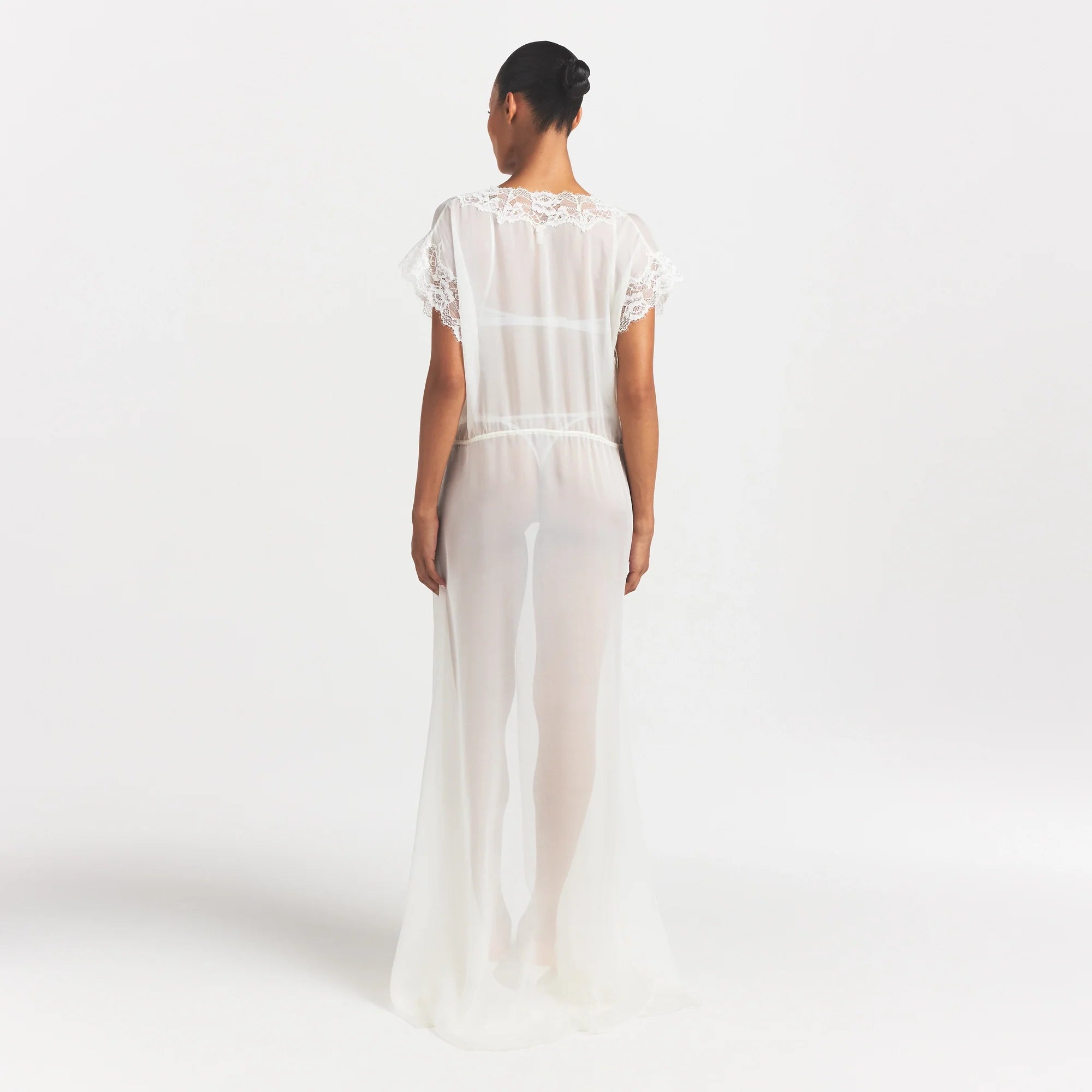 SKIMS ROMANCE LONG ROBE | IVORY ON A MODEL FRONT VIEW @ | FOCUS: 0.0, 1.0, 0.9