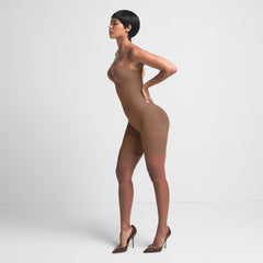 SEAMLESS SCULPT BUTT LIFTING OPEN BUST BODYSUIT | JASPER ON A MODEL SIDE VIEW