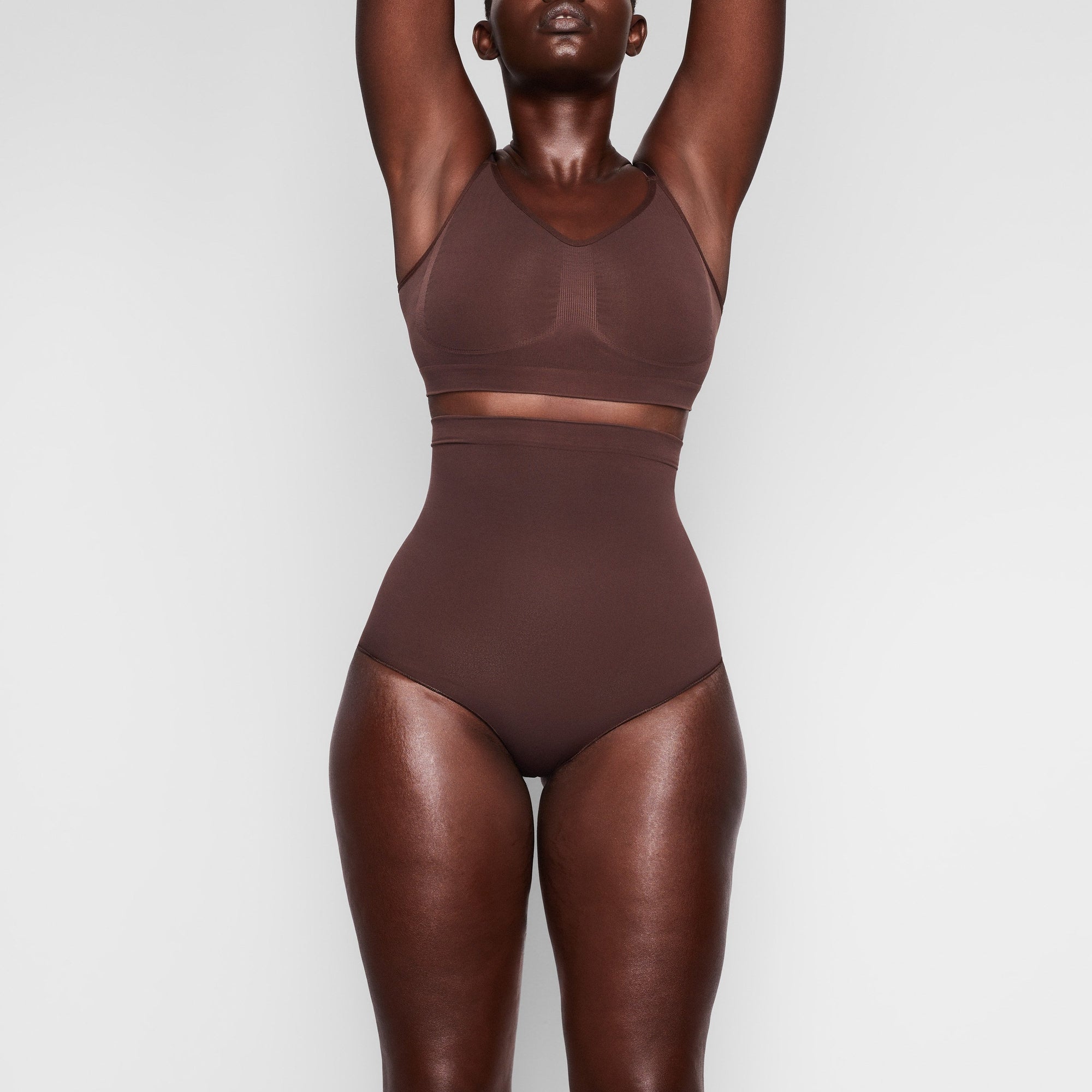 SEAMLESS SCULPT HIGH-WAISTED BRIEF WORN BY A MODEL IN FRONT VIEW, XL