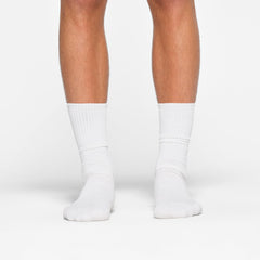 MENS TUBE CREW SOCK 3-PACK WORN BY A MODEL IN FRONT VIEW