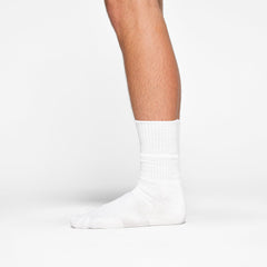 MENS TUBE CREW SOCK 3-PACK WORN BY A MODEL IN SIDE VIEW