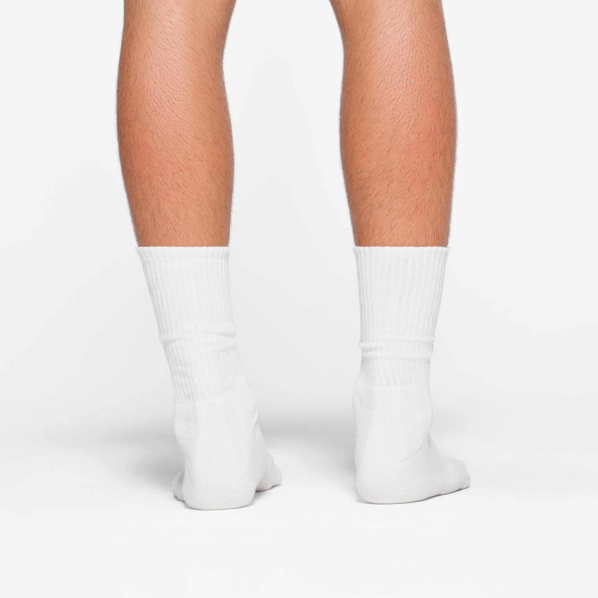 MENS TUBE CREW SOCK 3-PACK ON A MODEL BACK VIEW
