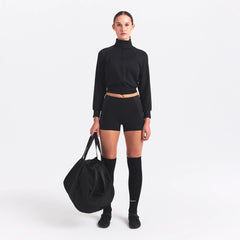 NikeSKIMS MATTE AND SHINE DRAWCORD 2" SHORT | OBSIDIAN/IGNEOUS ON A MODEL FRONT VIEW @ | FOCUS: 0.0, 1.0, 0.9
