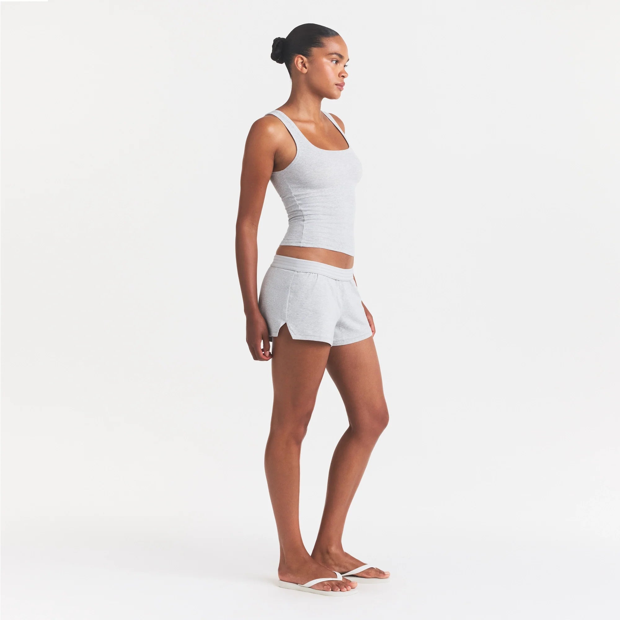 COTTON JERSEY LOOSE SHORT | LIGHT HEATHER GREY ON A MODEL FRONT VIEW @ | FOCUS: 0.0, 1.0, 0.9