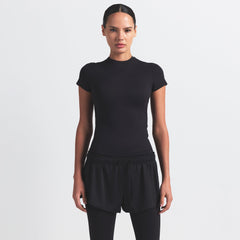 NikeSKIMS AIRY MINI SHORT | OBSIDIAN ON A MODEL FRONT VIEW @ | FOCUS: 0.9, 0.1, 0.7