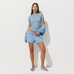 FRENCH TERRY CLASSIC SHORT | BLUE BELL ON A MODEL FRONT VIEW | FOCUS: 0.0, 1.0, 0.9