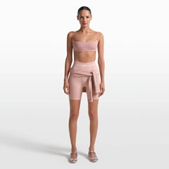 NikeSKIMS RIBBED SEAMLESS 5" BIKER SHORT | HIMALAYAN/ECRU ON A MODEL FRONT VIEW @ | FOCUS: 0.0, 1.0, 0.9